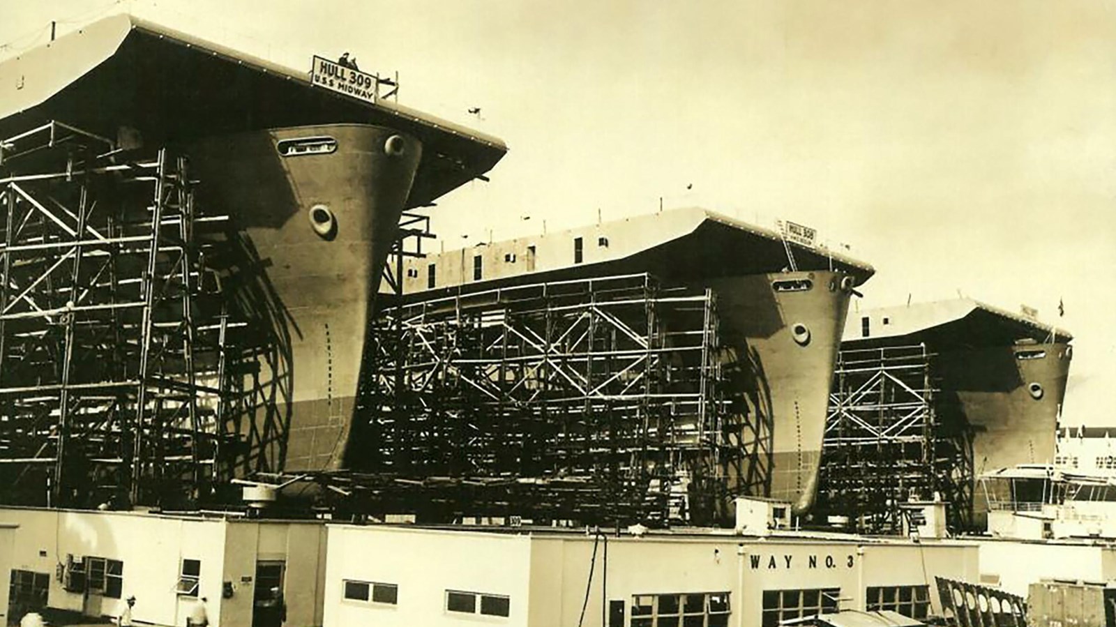 Historic photo of three large ships under construction in Richmond Shipyard. 