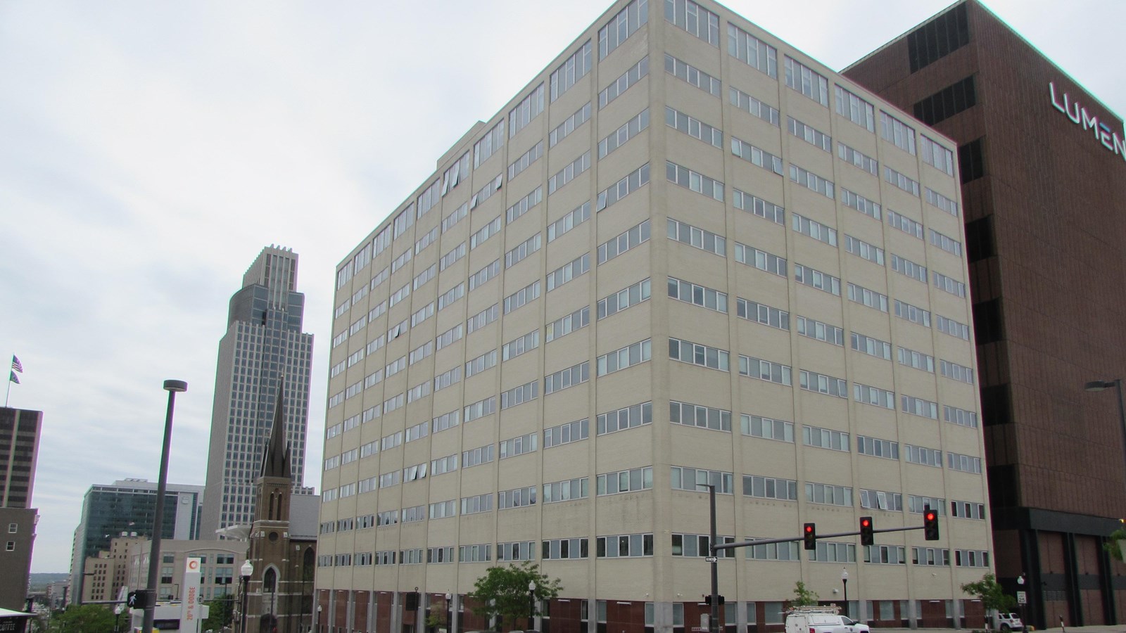 Eleven-story downtown office building. Strips of windows across each floor, little ornamentation.