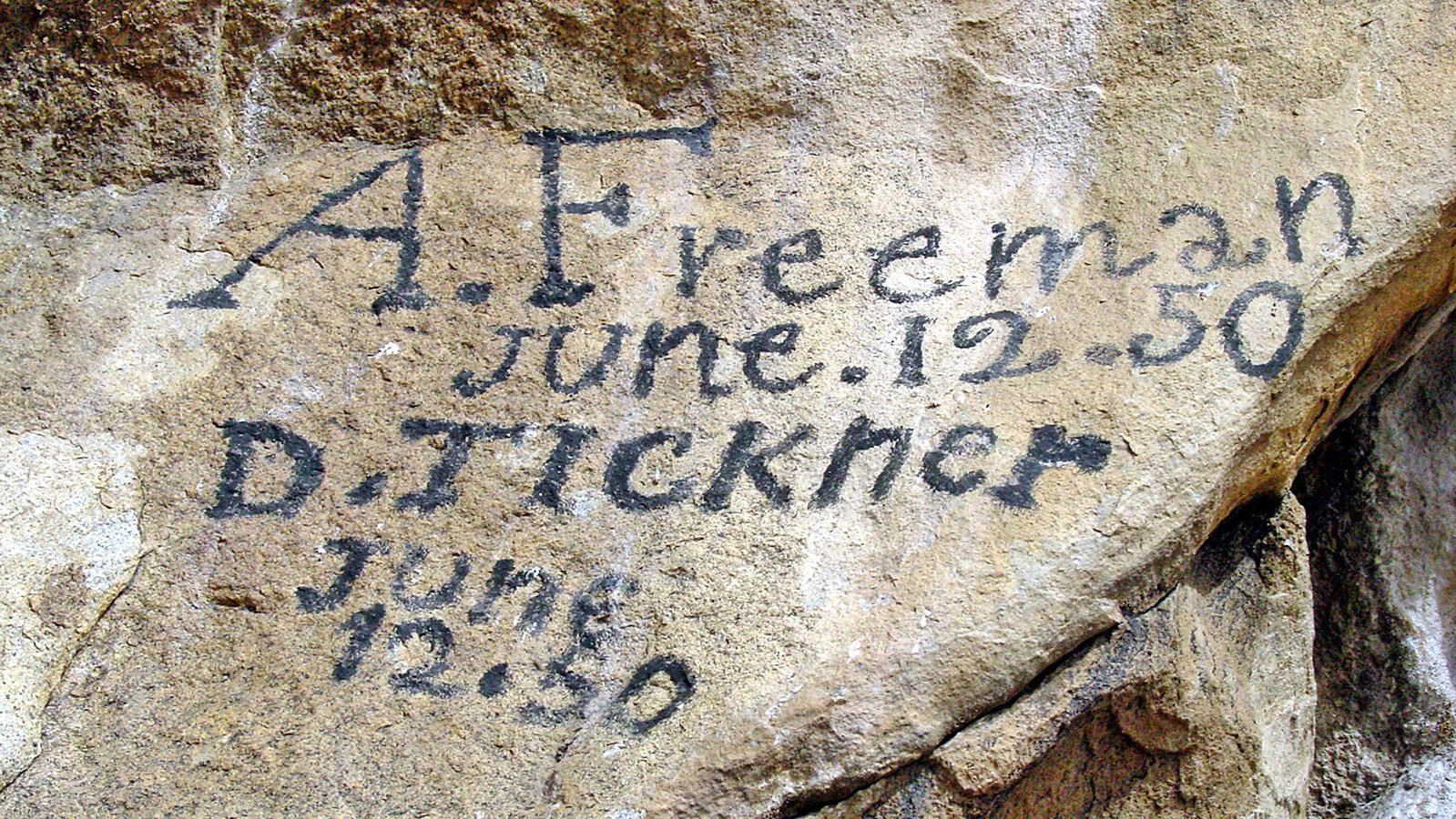 Emigrant signatures on the rock: A. Freeman June.12.50  D. Tickner June 12.50/