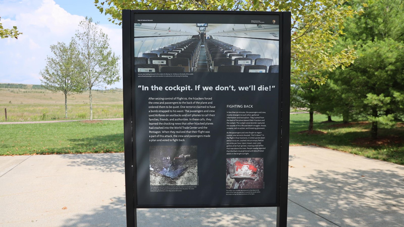 Sign with image of the inside of a plane showing AirFones.