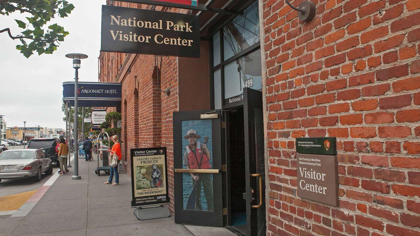  The front entrance to the Maritime Museum Visitor Center in the red brick Argonaut Hotel. 