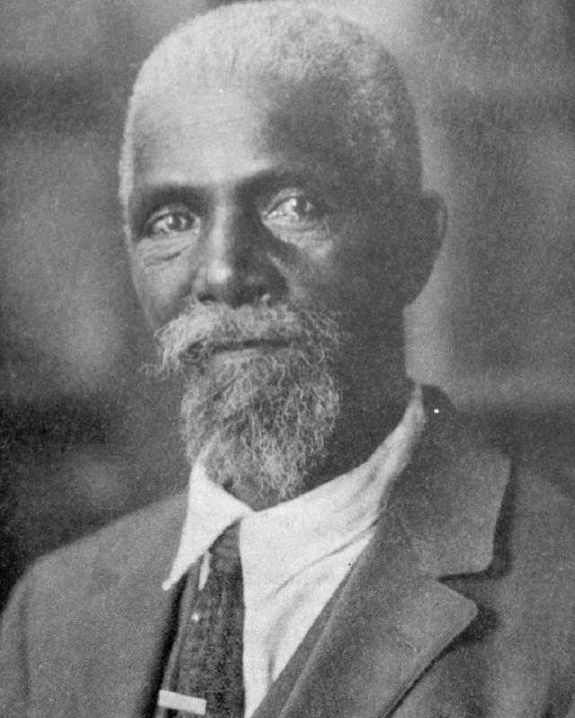Portrait photo of a man in a suit