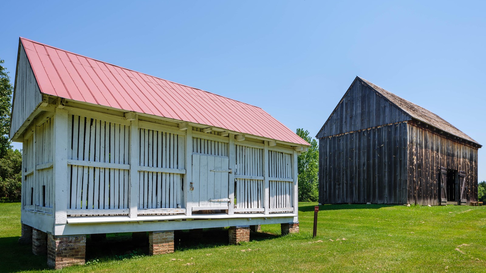 Corn Crib with Tobacco Barn behind