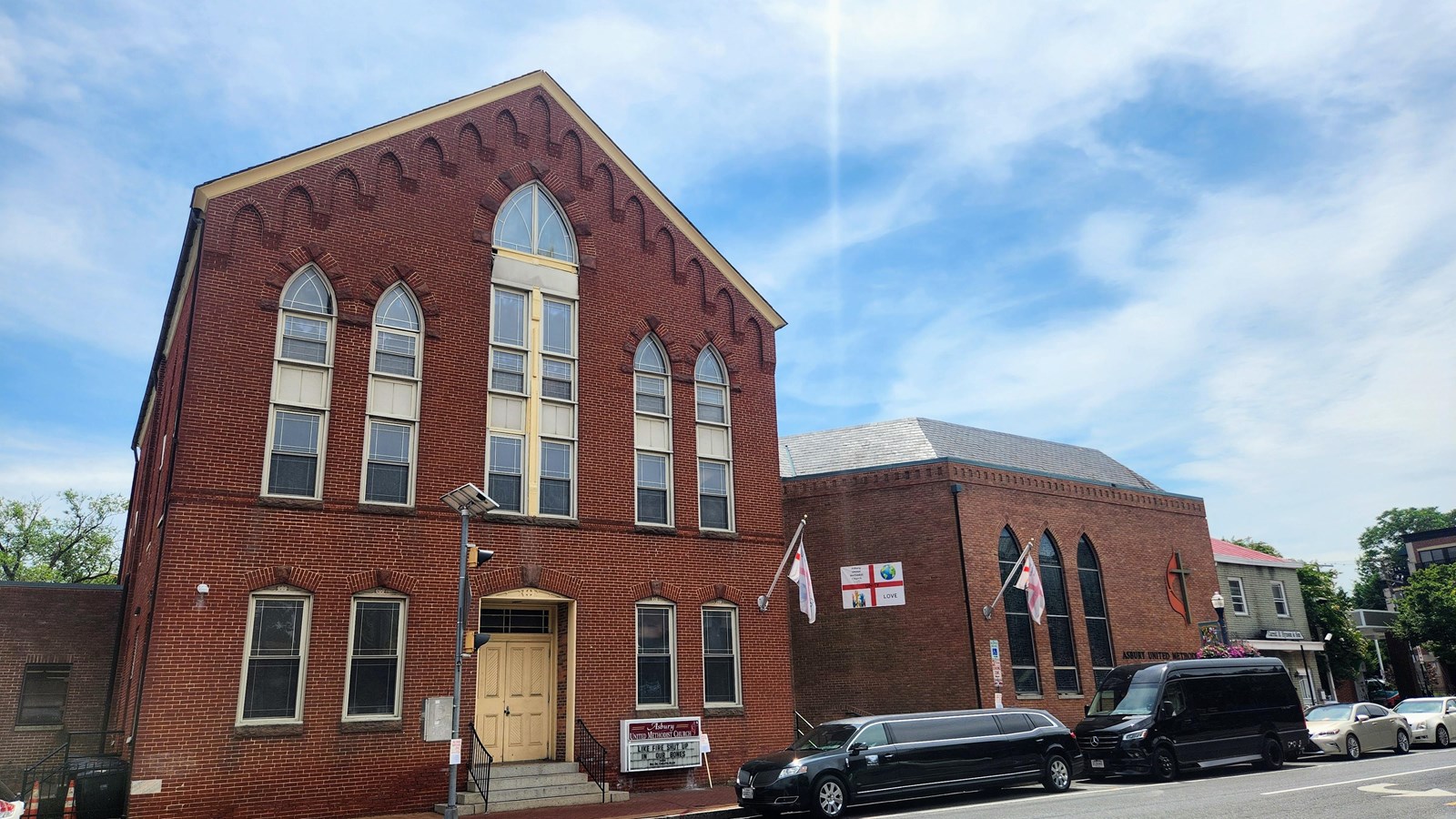 A red brick church building.