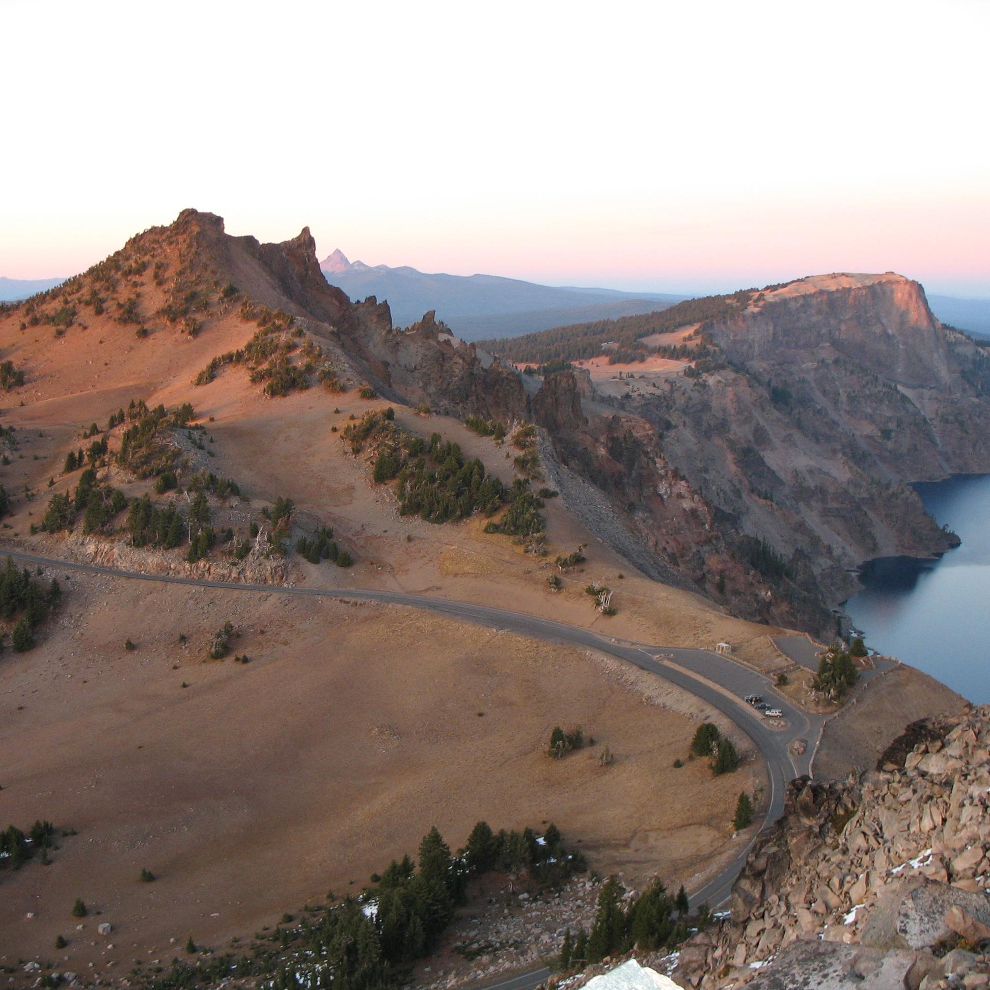 View of Rim Drive from Watchman Peak.  Hillman Peak and Crater Lake in the background.