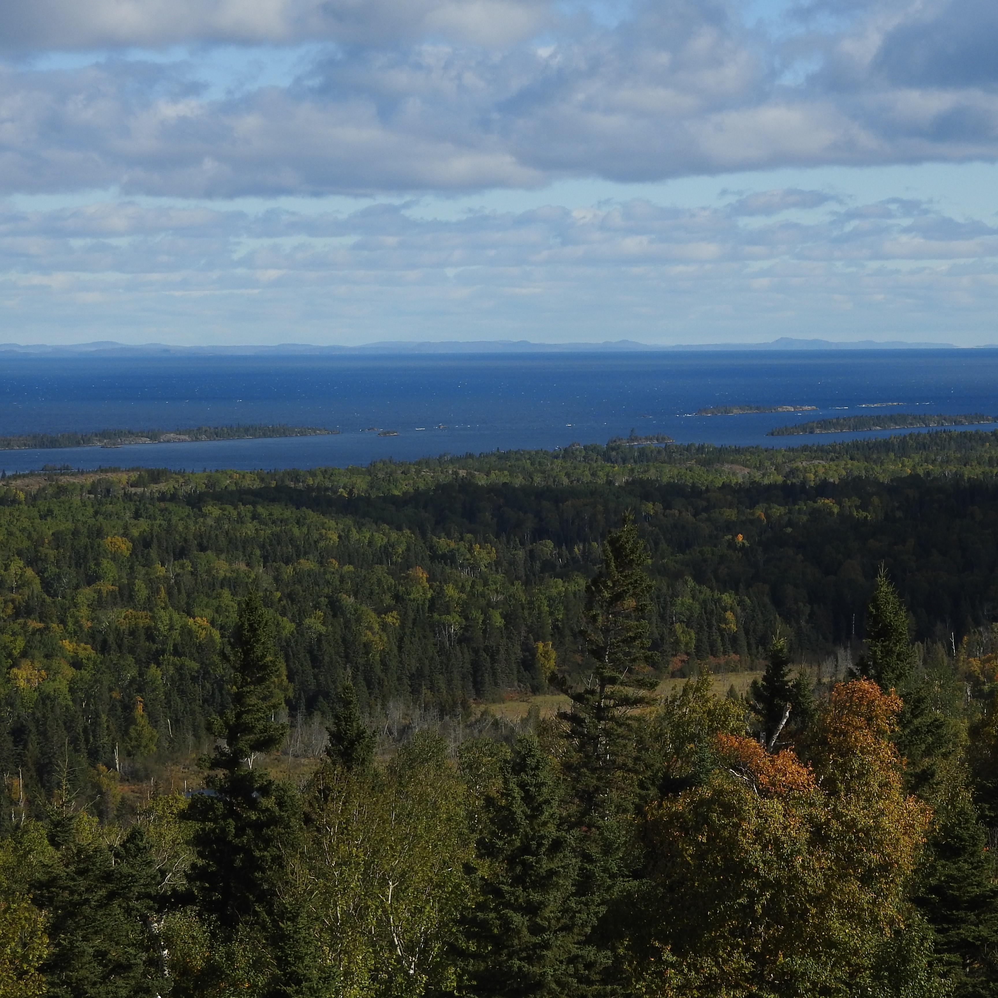 View from a ridge top. Lake Superior and the Canadian Shoreline can be seen in the distance. 