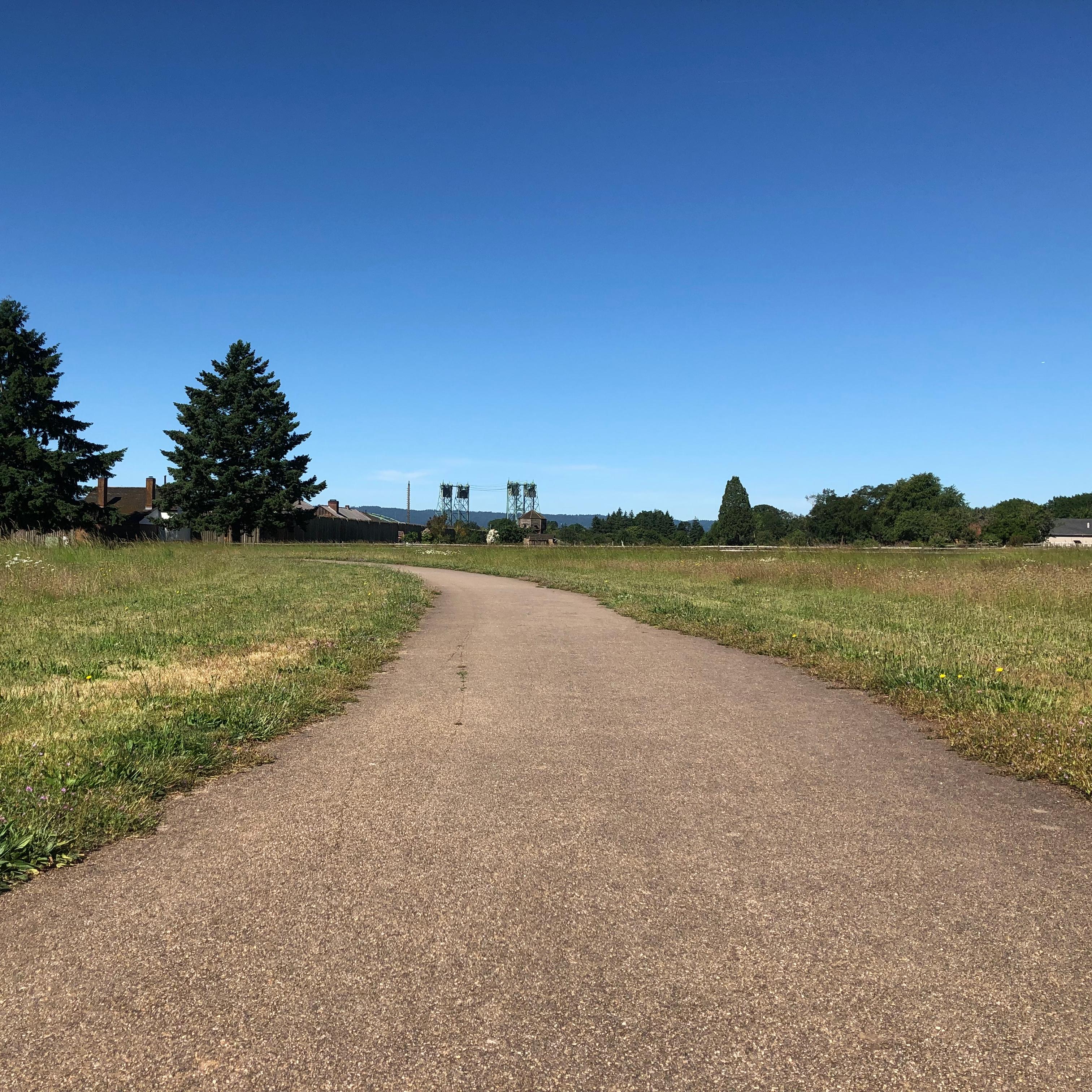 A paved trail on a sunny day