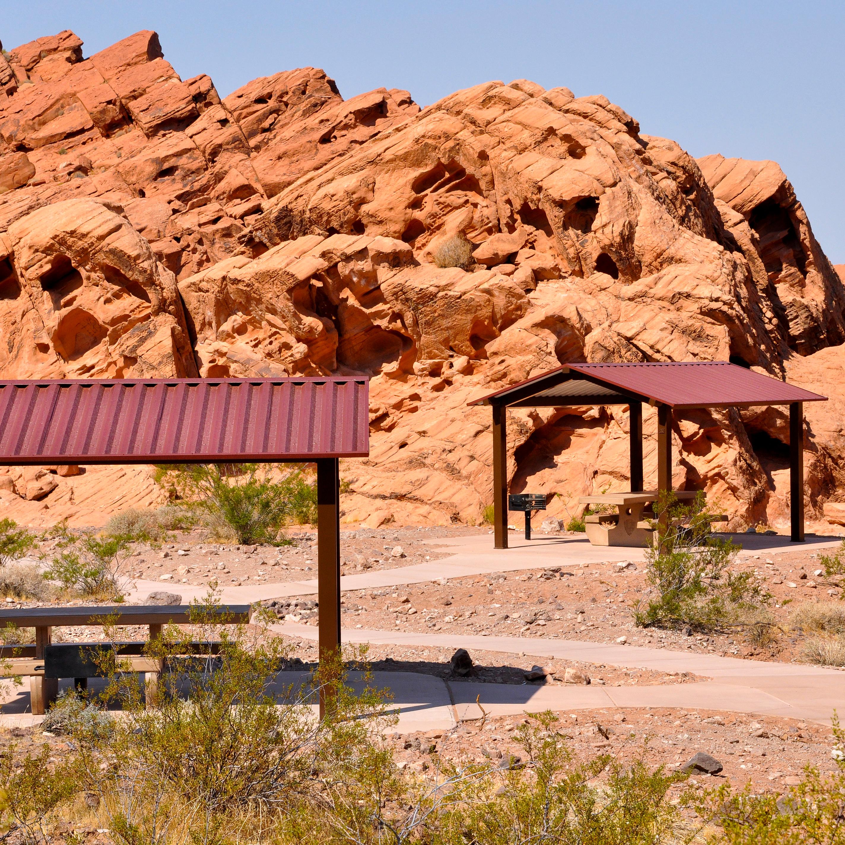 Picnic shelters in a red rock area