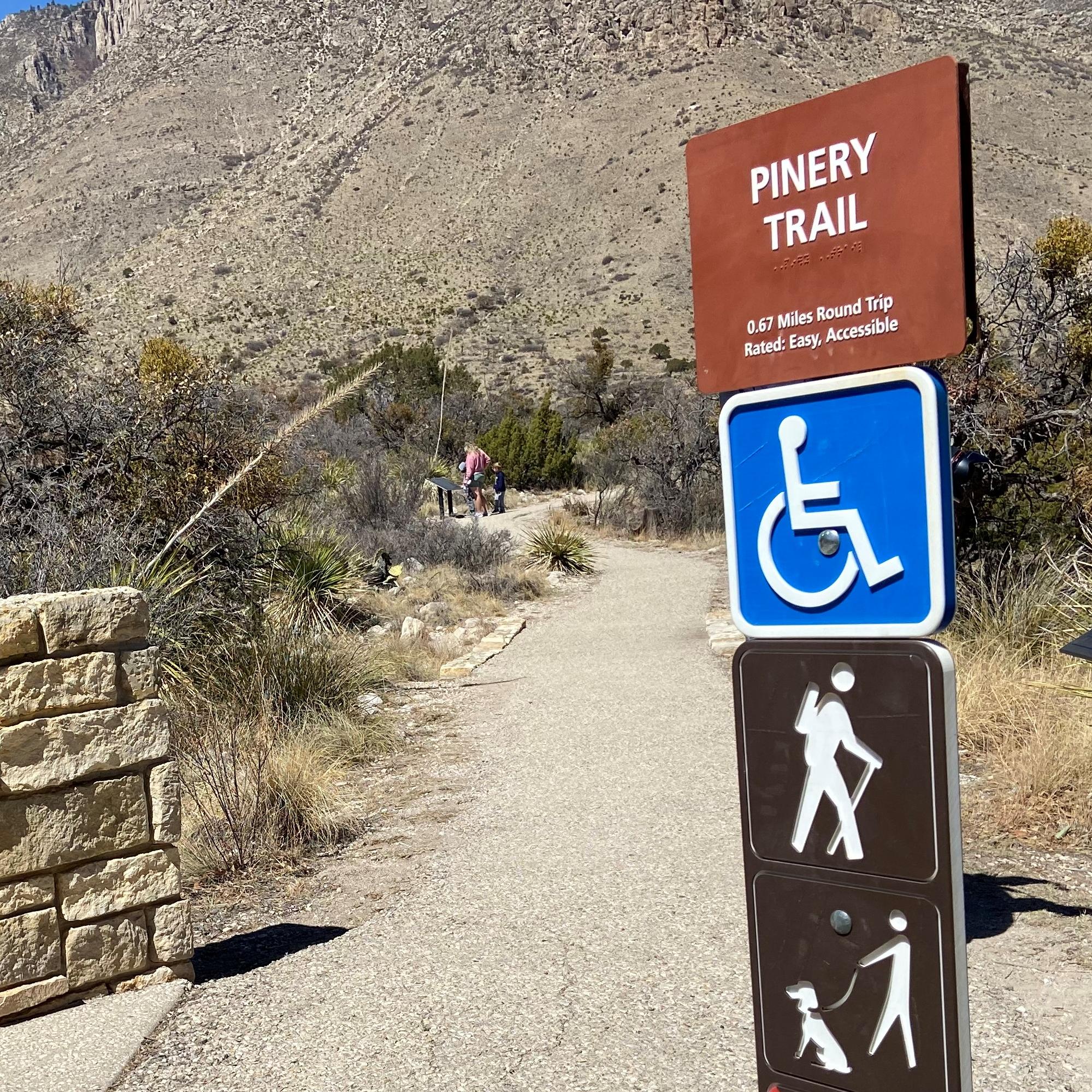 A signpost contains information about a trail