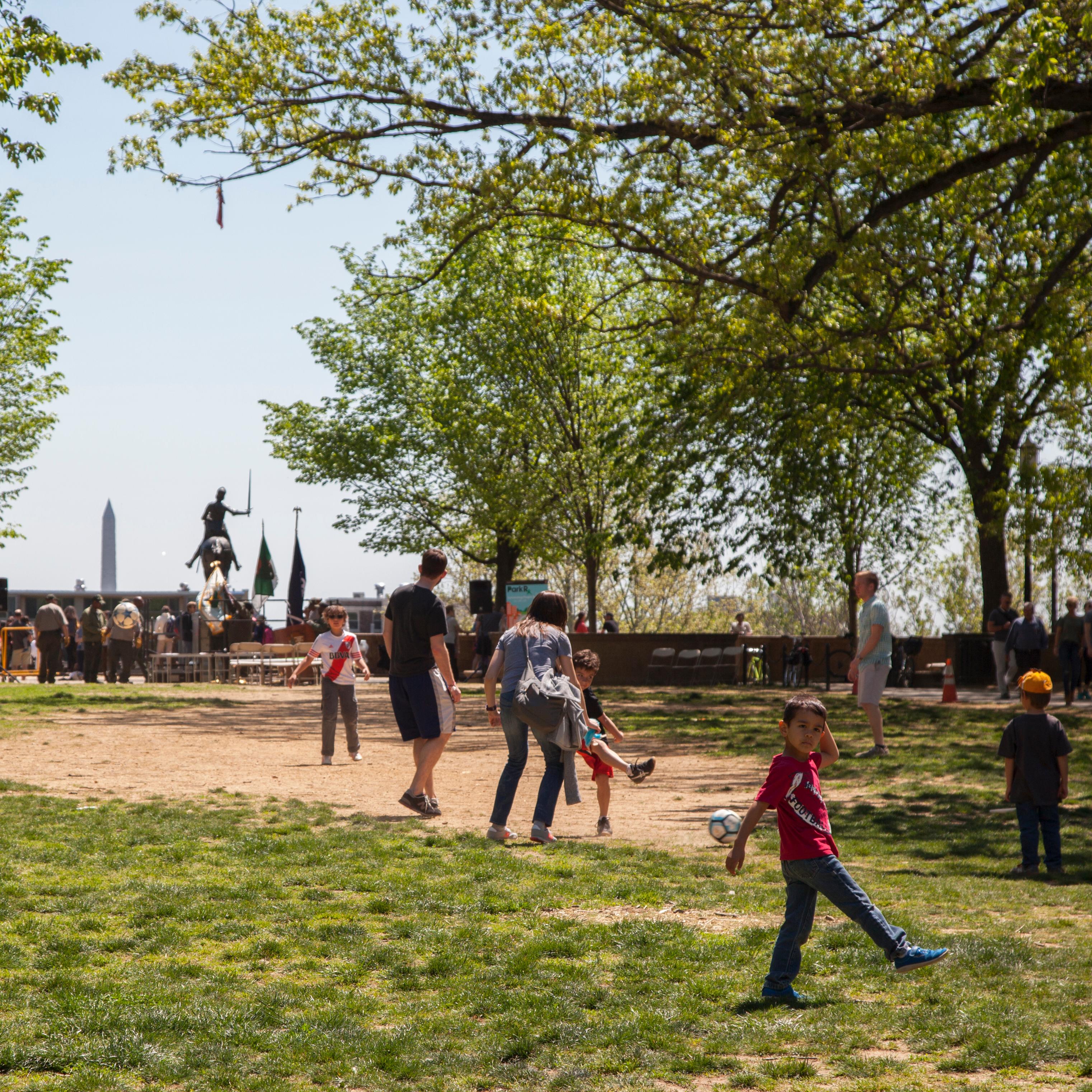 Visitors walk through Meridian Hill Park.