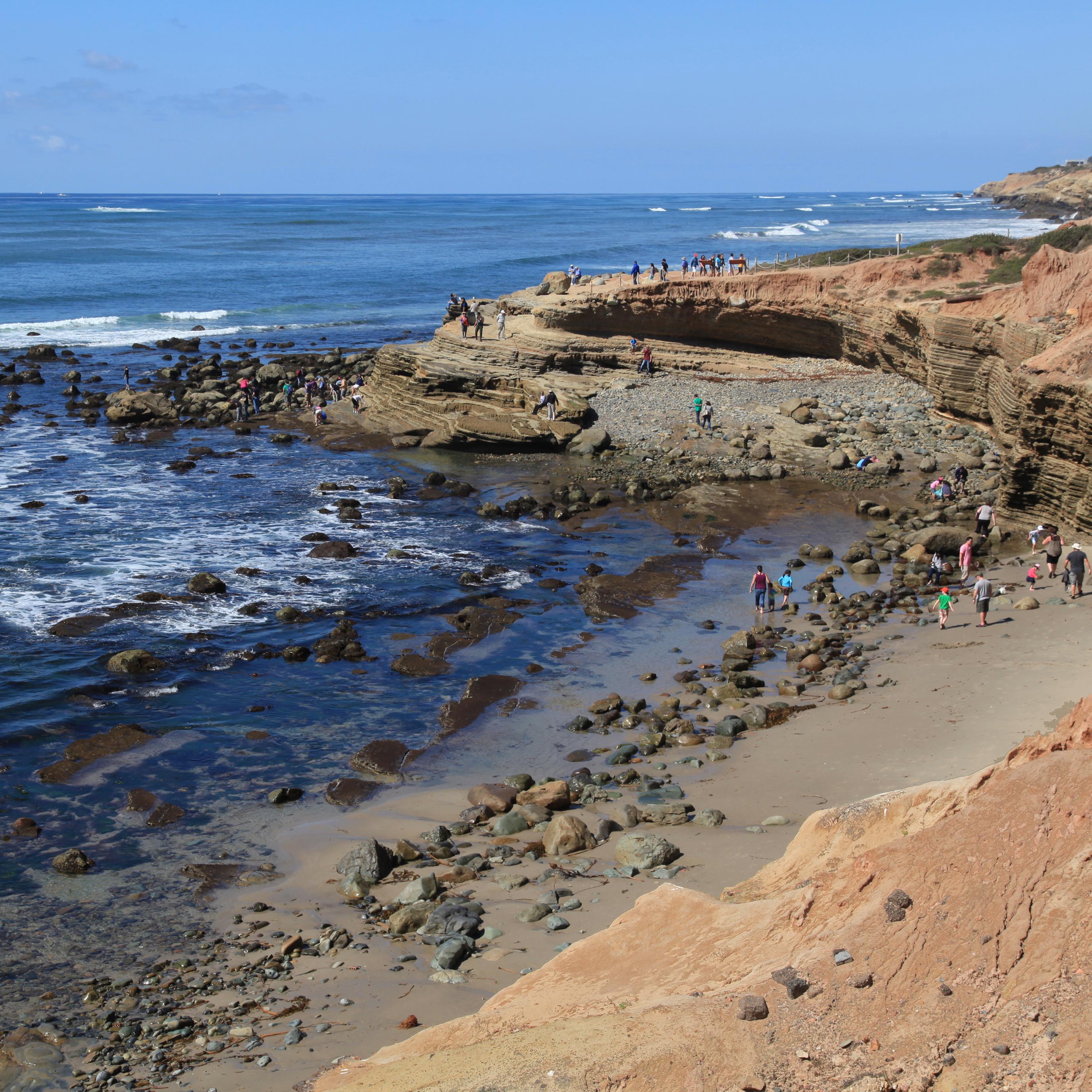 A rocky coastline on a sunny day