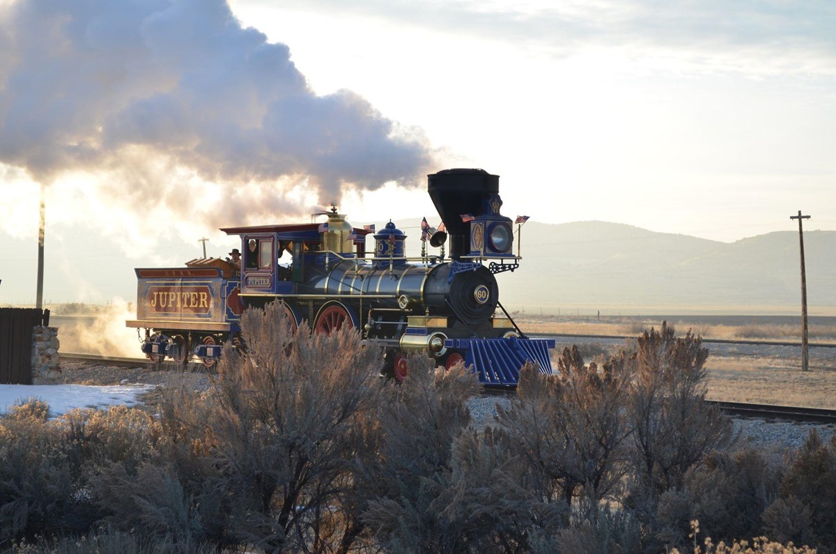 The Jupiter steam locomotive huffs past the visitor center
