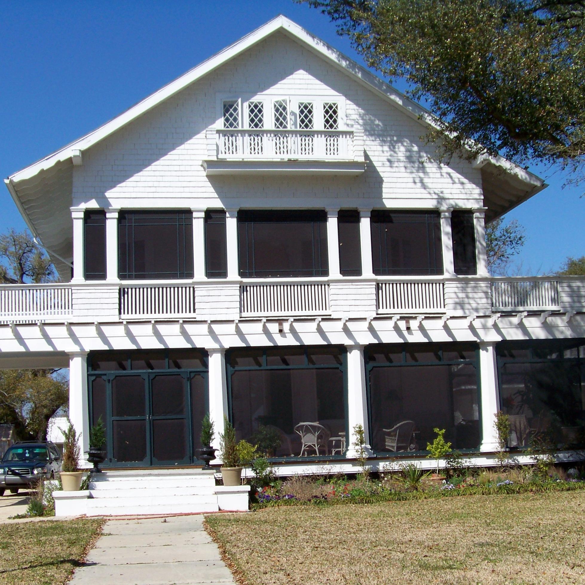 White frame house on a sunny day. (Schaffer House, MS)