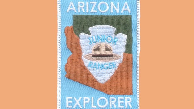 Patch for junior ranger activity featuring the state of Arizona and a ranger hat.