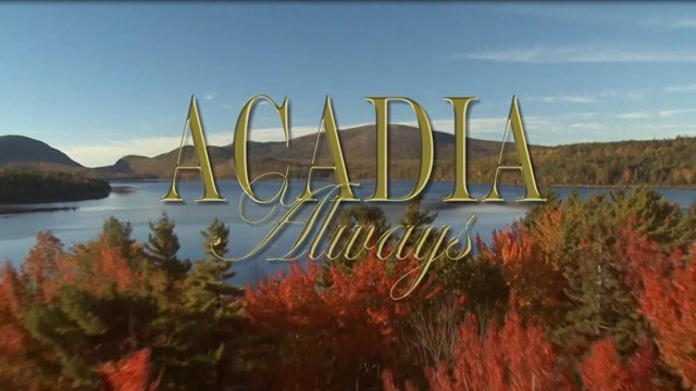 Aerial photo of Atlantic coastline with title for park movie called "Acadia Always" 