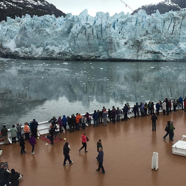 Cruise ship passengers experience a tidewater glacier up close.