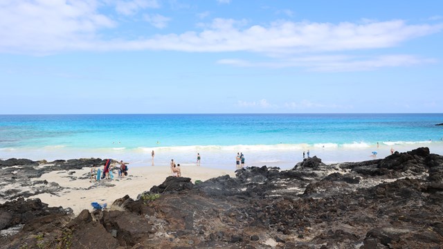 White sand beach with bright blue ocean