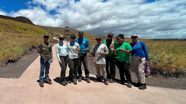 Group of interns posed in front of heiau