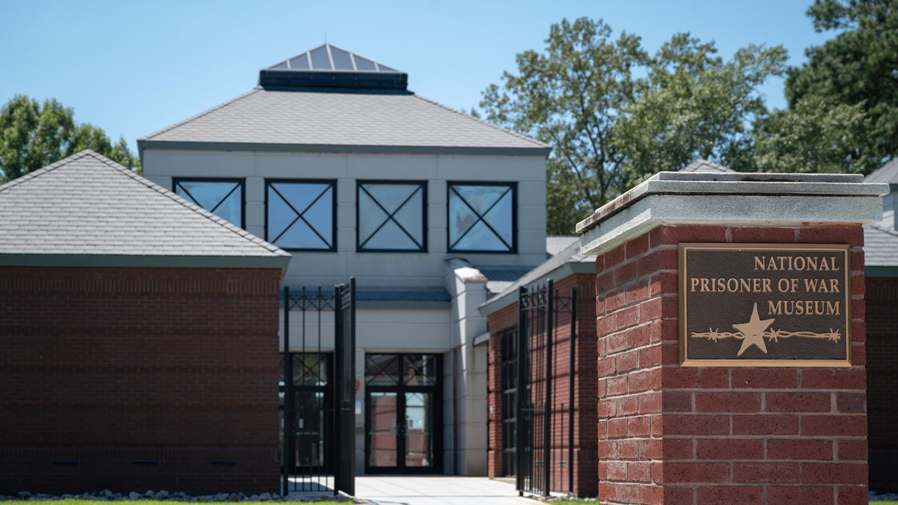 Large brick building titled the National Prisoner of War Museum 