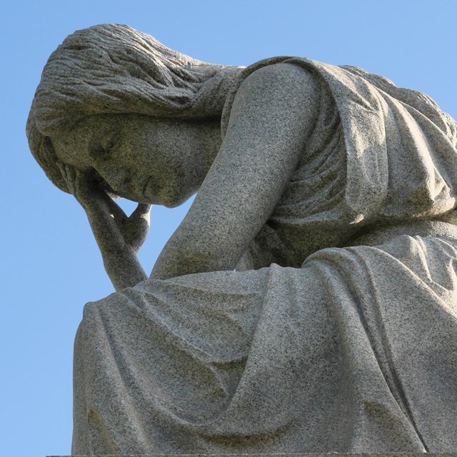 Monument featuring a young woman. 