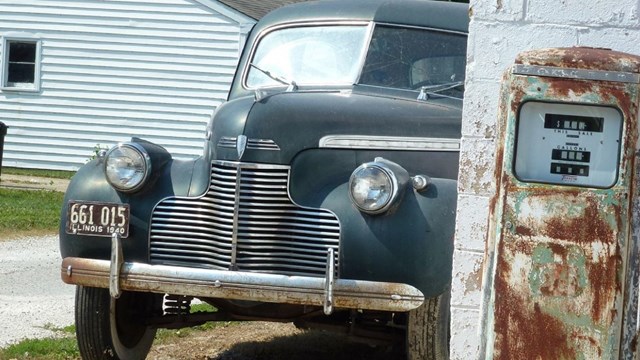 Old car next to gas station. CC0