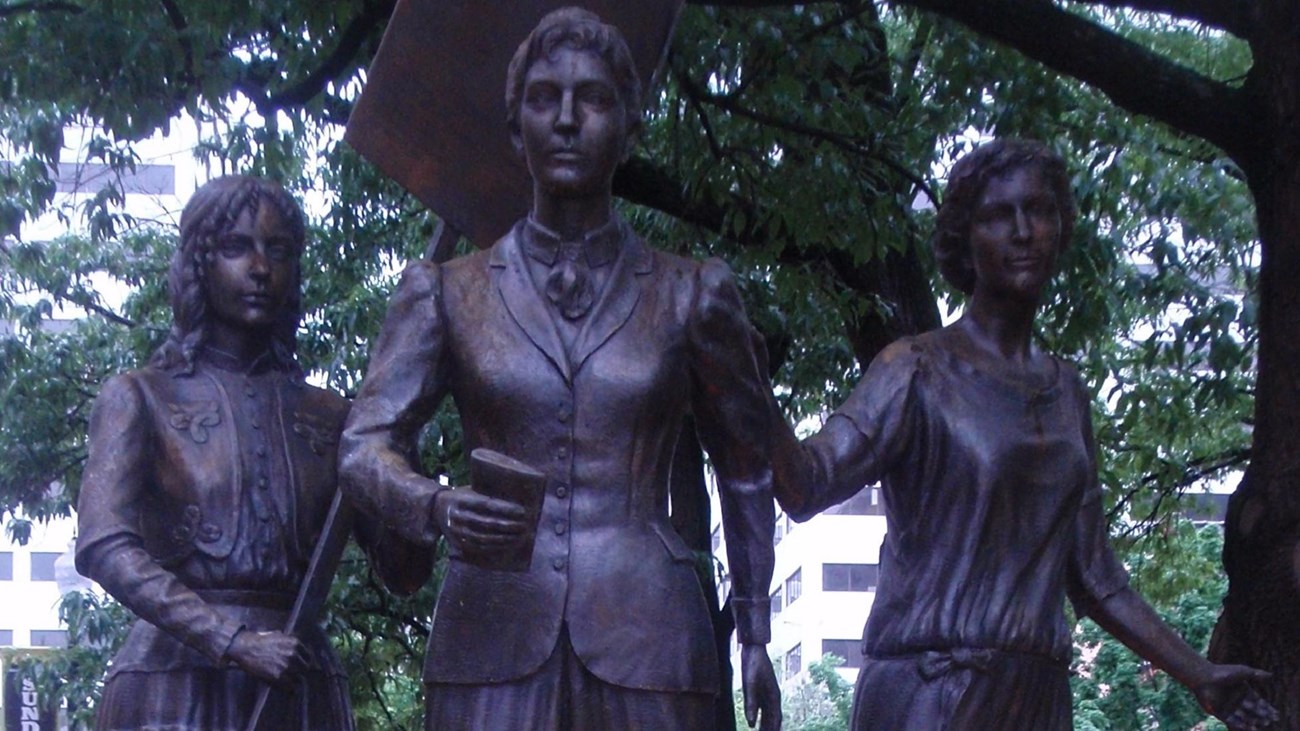 Statue of three women. Photo: by Joel Kramer, CC BY 2.0