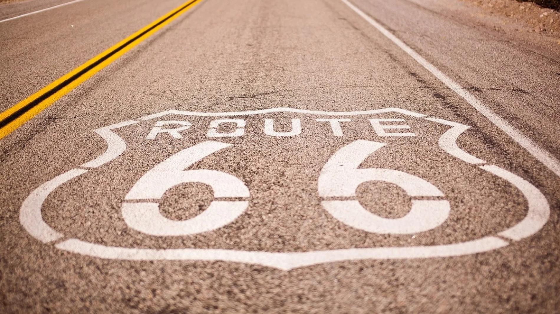 Image of Route 66 sign next to restaurant. 