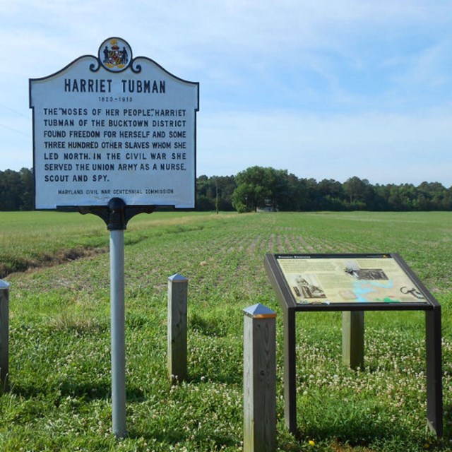 Historical signage by side of road