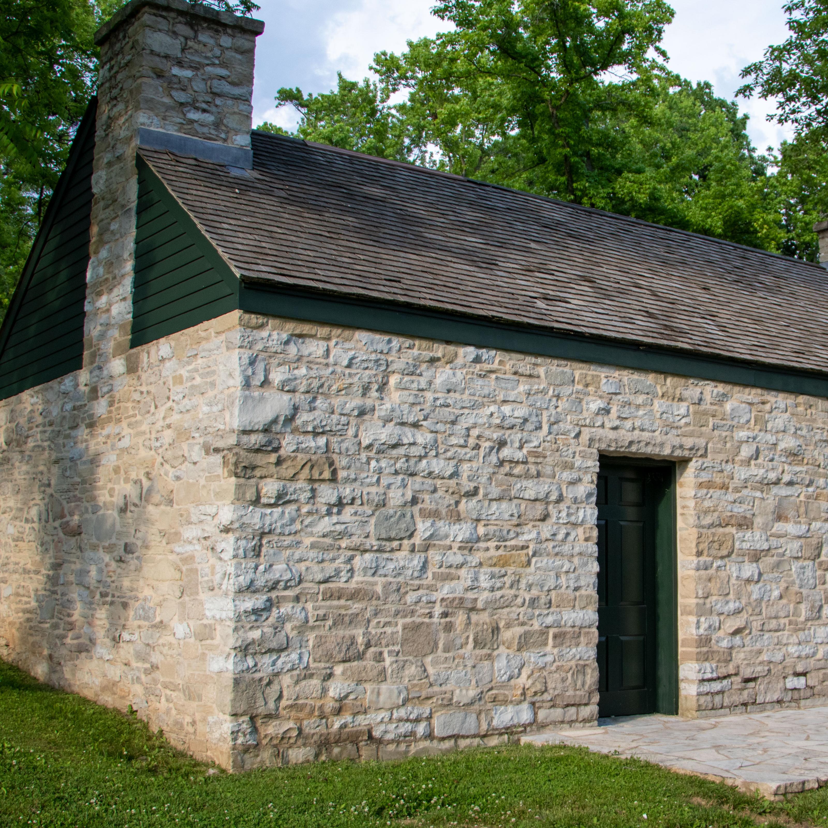 (Summer kitchen exterior, front)