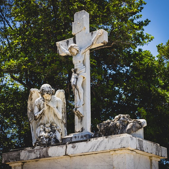 White stone grave monument