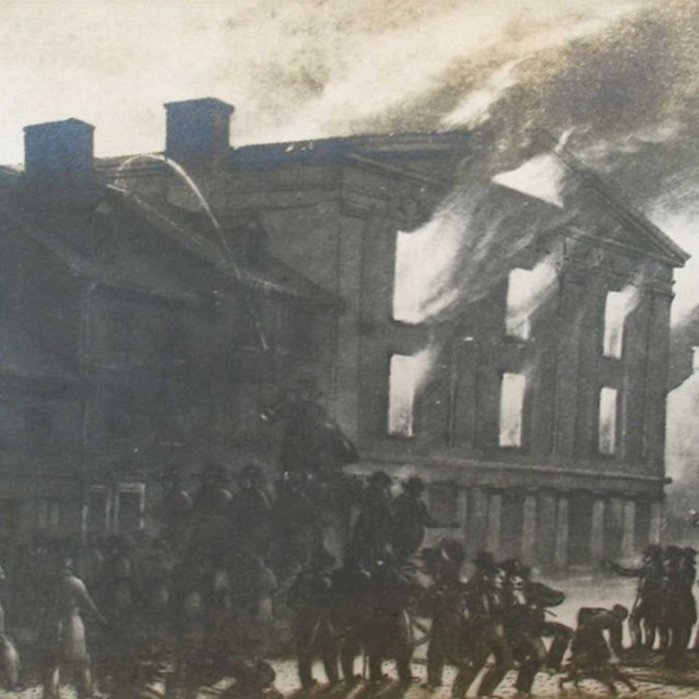 Black and white engraving of flames shooting out of a multistory building while a crowd watches.