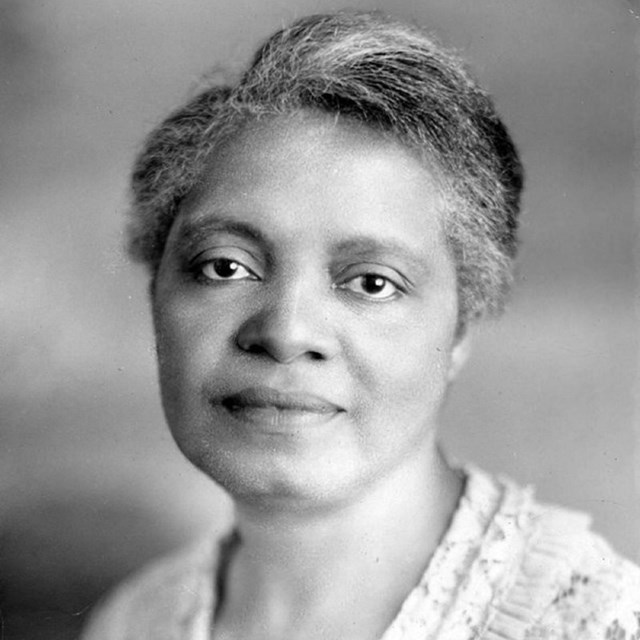 Portrait image of an African American woman with short hair