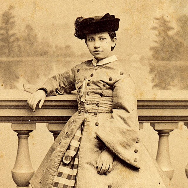 A photograph of a young Alice Longfellow