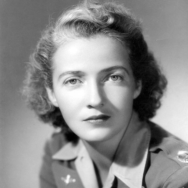 Headshot image of white woman in military uniform