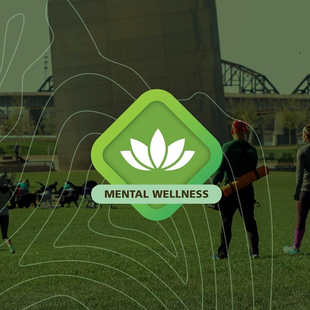 green tilted square graphic of a lotus blossom on top of a green tinted photo of people doing yoga