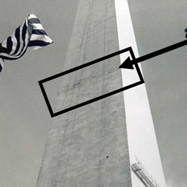 Washington Monument with square and arrow indicating stone in middle