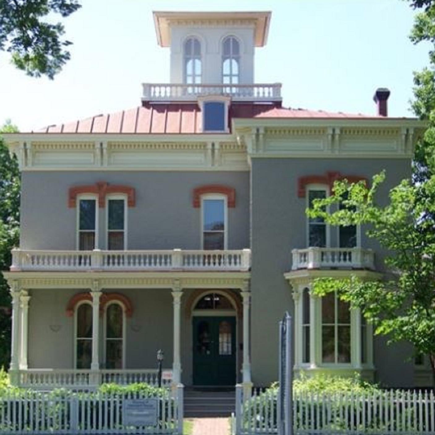 Photo of a large house. 