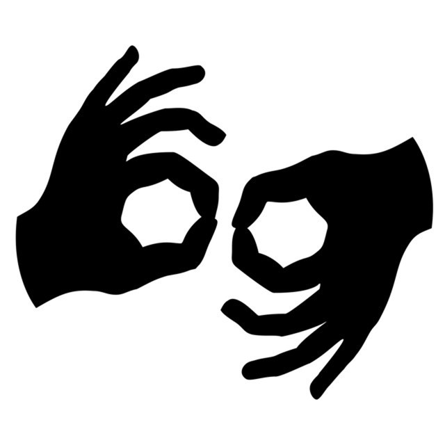 A black and white image of hands using sign language.