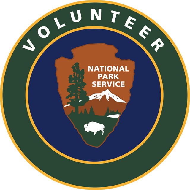 A circular logo with the NPS Arrowhead and the word 
