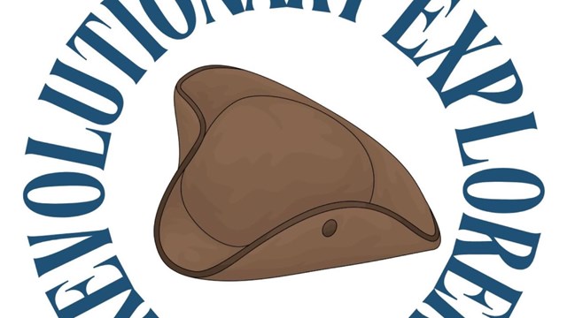 Brown tricorn hat with word Revolutionary Explorer around it