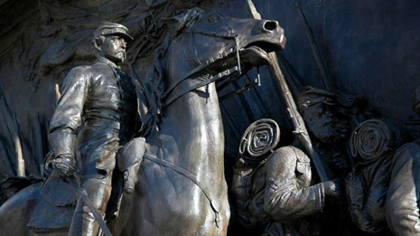Close up view of bronze high relief sculpture of a civil war officer on horseback