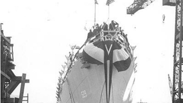 Black and white image of the launching of the Destroyer Escort USS Mason 