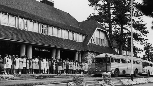 Historic photo of people standing in front of the Bryce Canyon Lodge.