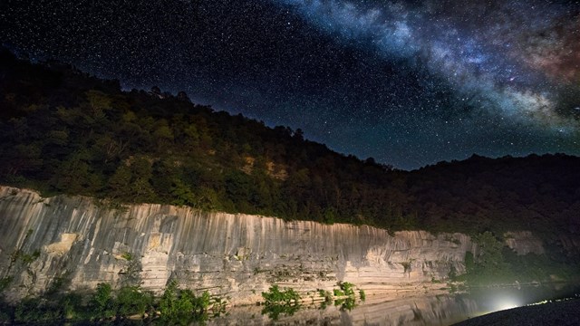 A star studded sky above the Buffalo River and Painted Bluff