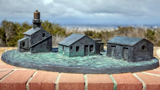 A bronze tactile display of the Old Point Loma Lighthouse.