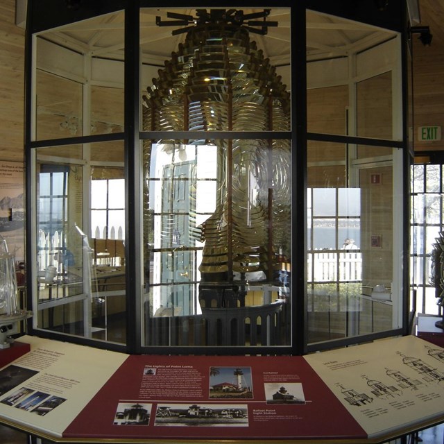 A lighthouse lens inside a building