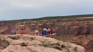 Visitors enjoy views of the canyon from the overlooks