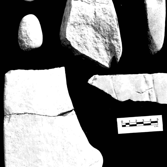 6 stone tools are show in black and white.