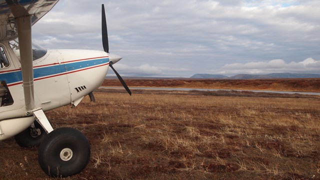 A plane looks out at the view of Cape Krusenstern National Monument 