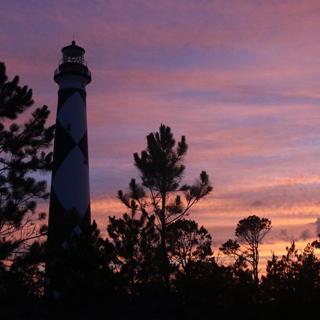 Visitors enjoy the view from the top of the lighthouse